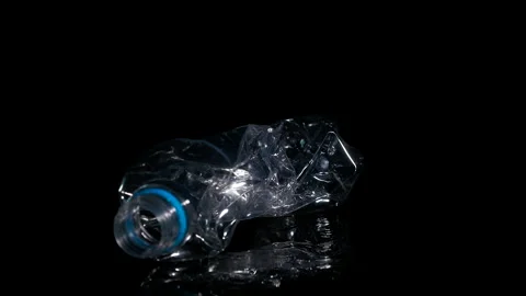 Plastic bottle on a black background. Stock-Footage 253924507