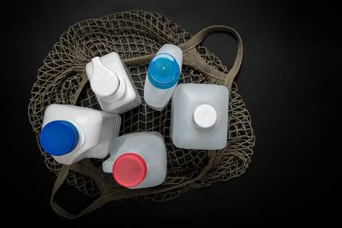 Plastic bottle on black background. High density polyethylene packaging for r Stock Photos