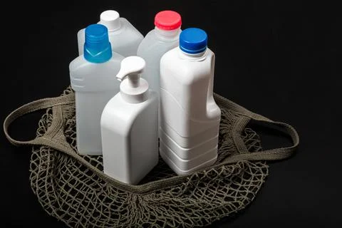 Plastic bottle on black background. High density polyethylene packaging for r Stock Photos