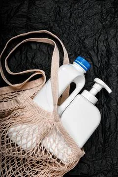 Plastic bottle on black background. High density polyethylene packaging for r Stock Photos