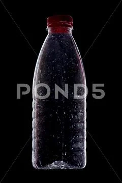 Plastic bottle on black Stock Photos