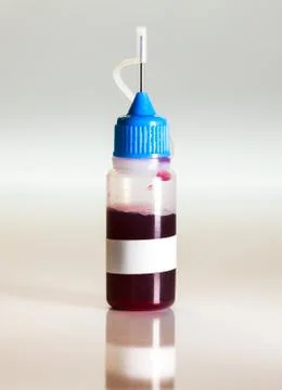 Plastic bottle with blood sample, doping medical concept Stock Photos