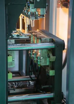 Plastic bottle blowing machine Stock Photos