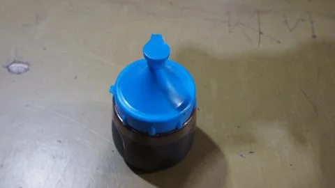 Plastic bottle with blue cap Stock Photos