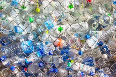 Plastic bottle in cage Stock Photos