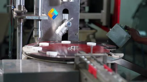 Plastic bottle cap Manufacturing in a automatic machine Stock Footage 246921720