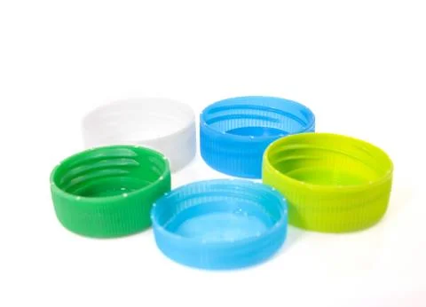 Plastic bottle caps isolated against a white background Stock Photos