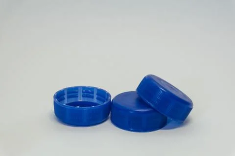 Plastic bottle caps on a white background Stock Photos