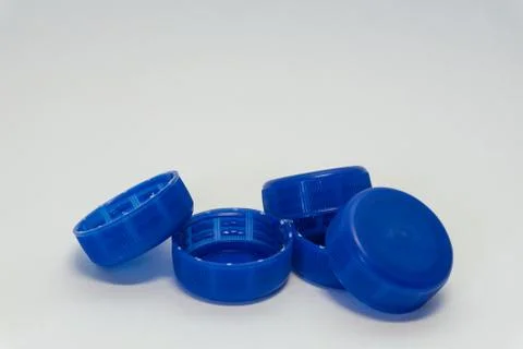 Plastic bottle caps on a white background Stock Photos