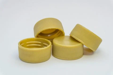 Plastic bottle caps on a white background Stock Photos