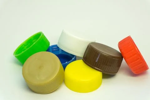 Plastic bottle caps on a white background Stock Photos
