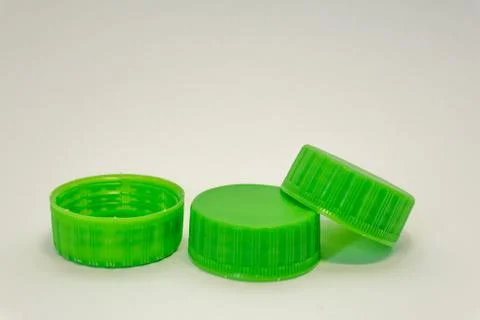Plastic bottle caps on a white background Stock Photos