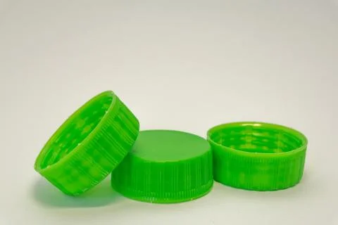 Plastic bottle caps on a white background Stock Photos