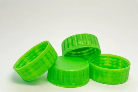 Plastic bottle caps on a white background Stock Photos