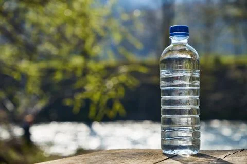 Plastic bottle with clean drinking water. Stock Photos