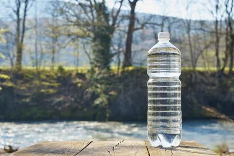 Plastic bottle with clean drinking water. Stock Photos