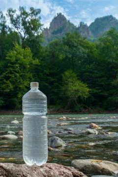 Plastic bottle with clean drinking water. Stock Photos
