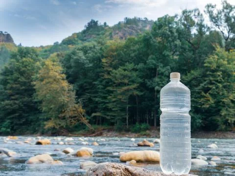 Plastic bottle with clean drinking water. Stock Photos