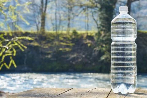 Plastic bottle with clean drinking water. Stock Photos
