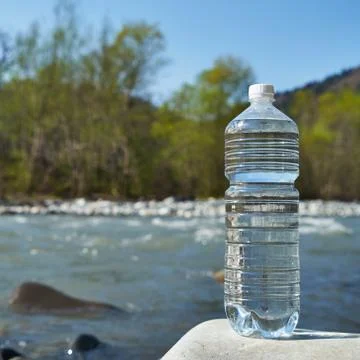 Plastic bottle with clean drinking water. Stock Photos