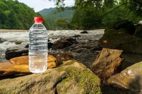 Plastic bottle with clean drinking water. Stock Photos