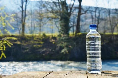 Plastic bottle with clean drinking water. Stock Photos