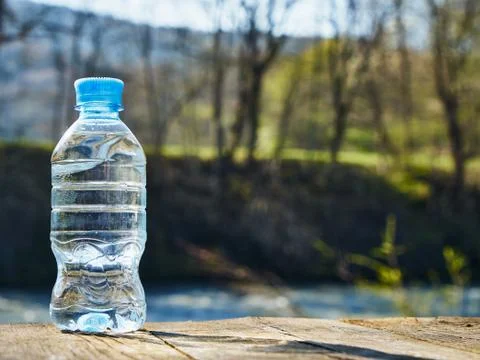 Plastic bottle with clean drinking water. Stock Photos