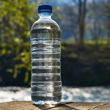 Plastic bottle with clean drinking water. Stock Photos