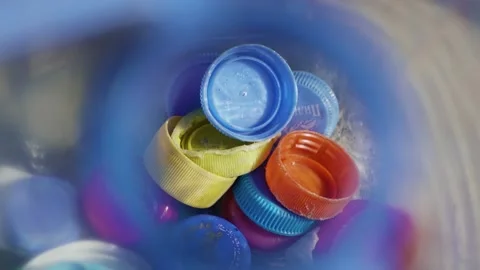 Plastic bottle on the coast. Ocean pollution Stock Footage 185107861