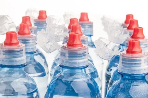 Plastic bottle of drinking water isolated on white Stock Photos