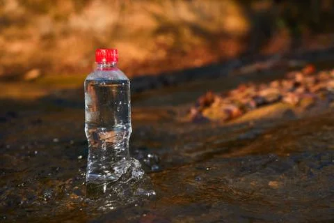 Plastic bottle with drinking water. Stock Photos