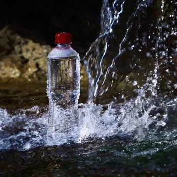 Plastic bottle with drinking water. Stock Photos