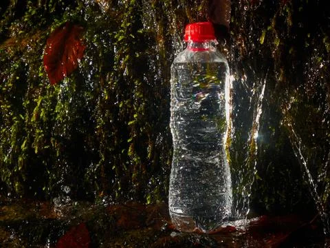 Plastic bottle with drinking water. Stock Photos