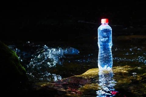 Plastic bottle with drinking water. Stock Photos