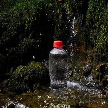 Plastic bottle with drinking water. Stock Photos