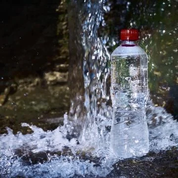 Plastic bottle with drinking water. Stock Photos