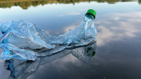 Plastic bottle garbage on sea shore lake. Stock Footage 251525136