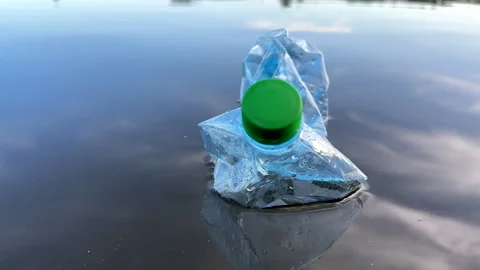 Plastic bottle garbage on sea shore lake. Stock Footage 251526848