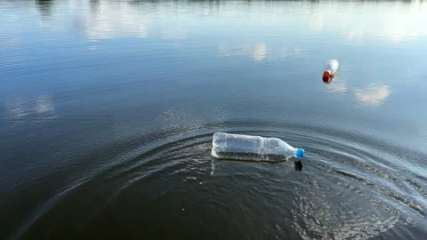 Plastic bottle garbage on sea shore lake. Stock Footage 251526852