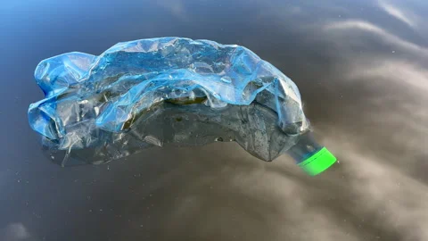 Plastic bottle garbage on sea shore lake. Stock Footage 251527085
