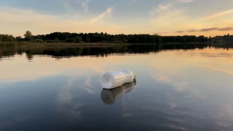 Plastic bottle garbage on sea shore lake. Stock Footage 251531615