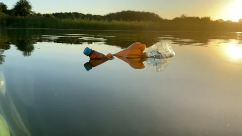 Plastic bottle garbage on sea shore lake. Stock Footage 251531908