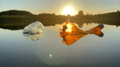 Plastic bottle garbage on sea shore lake. Stock Footage 251533604