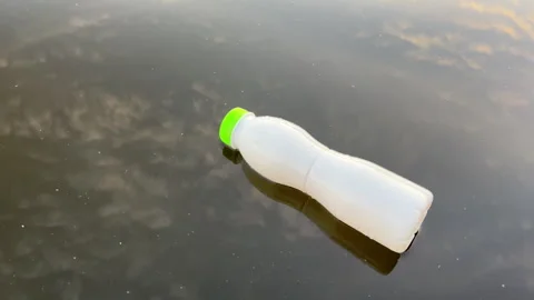 Plastic bottle garbage on sea shore lake. Stock Footage 251533676