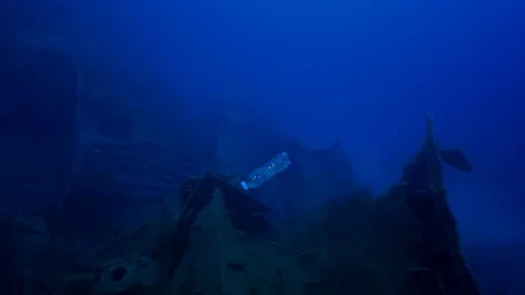 Plastic Bottle Goes Down Deep Underwater Stock Footage 123441795