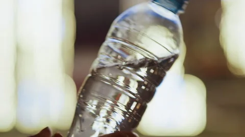 Plastic bottle imagery. Translucent plastic container under bright illumination Stock Footage 337368791
