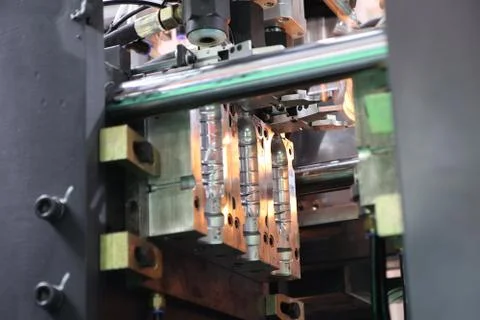 Plastic bottle injection mould set in machine ; Stock Photos