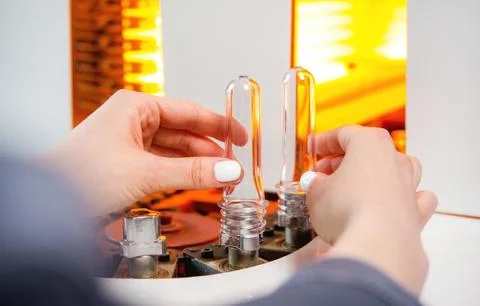 Plastic bottle making process Stock Photos