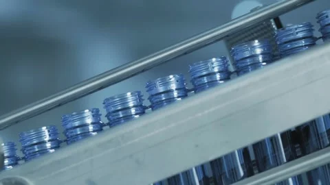 Plastic bottle manufacturing Raw material, production blow method. Production Stock-Footage 334587515