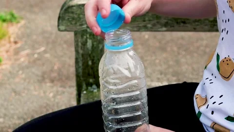 Plastic bottle opening Stock Footage 135392173